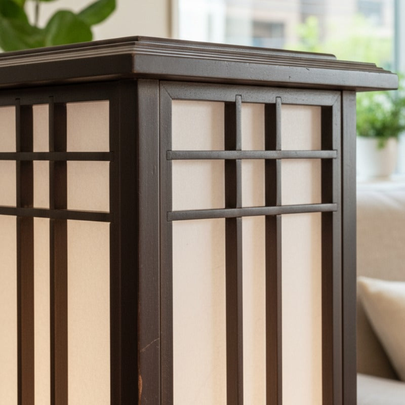 Close up detail of lamp japanese shoji showing dark wood pagoda roof and precise grid pattern with bright window and green plants