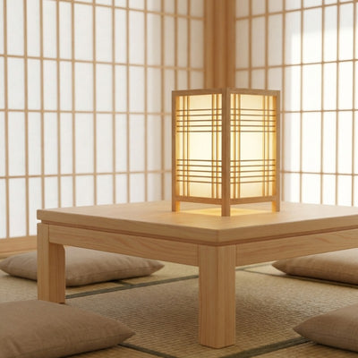 Traditional lamp shoji with warm glowing light and wood grid frame on chabudai table in tatami room