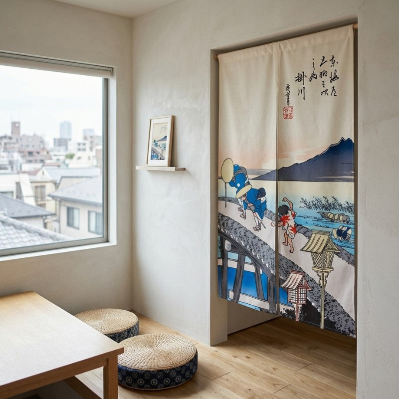 Long japanese noren curtain Hiroshige Kakegawa bridge scene in bright minimalist room with low table and floor cushions