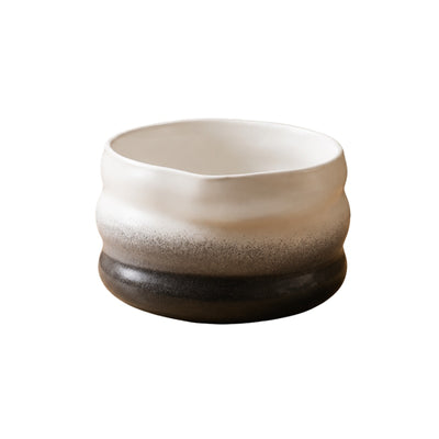 Matcha ceramic bowl in black with white-to-dark gradient and wavy ribbed texture on white background