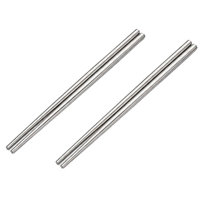 Two pairs of metal chopsticks in brushed stainless steel displayed side by side on white background