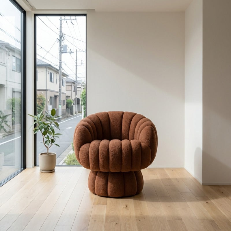 Modern Japanese sofa brown with terracotta bubble upholstery on light wood flooring near window overlooking residential neighborhood