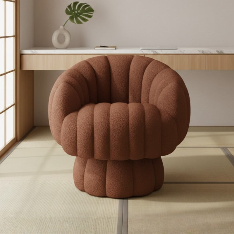 Modern japanese sofa with terracotta bubble texture on tatami floor beneath floating shelf with marble countertop and monstera leaf