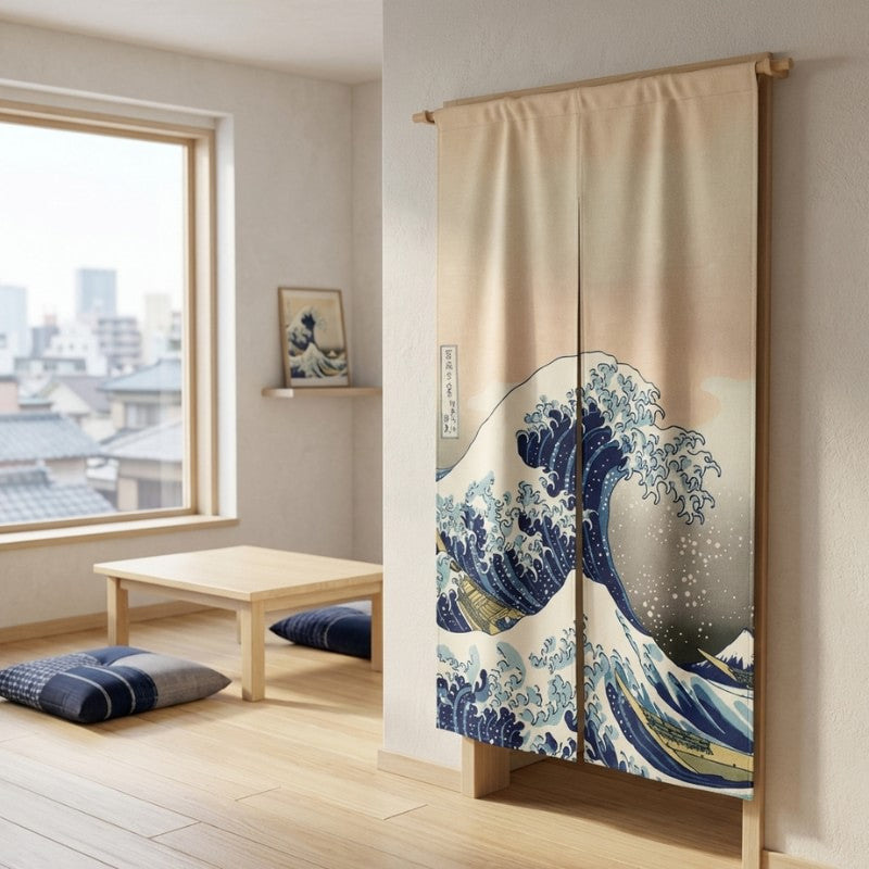 Noren japanese door curtain wave with Hokusai Great Wave on cream fabric displayed on wooden rod in minimalist Japanese room with low table floor cushion and city rooftop view