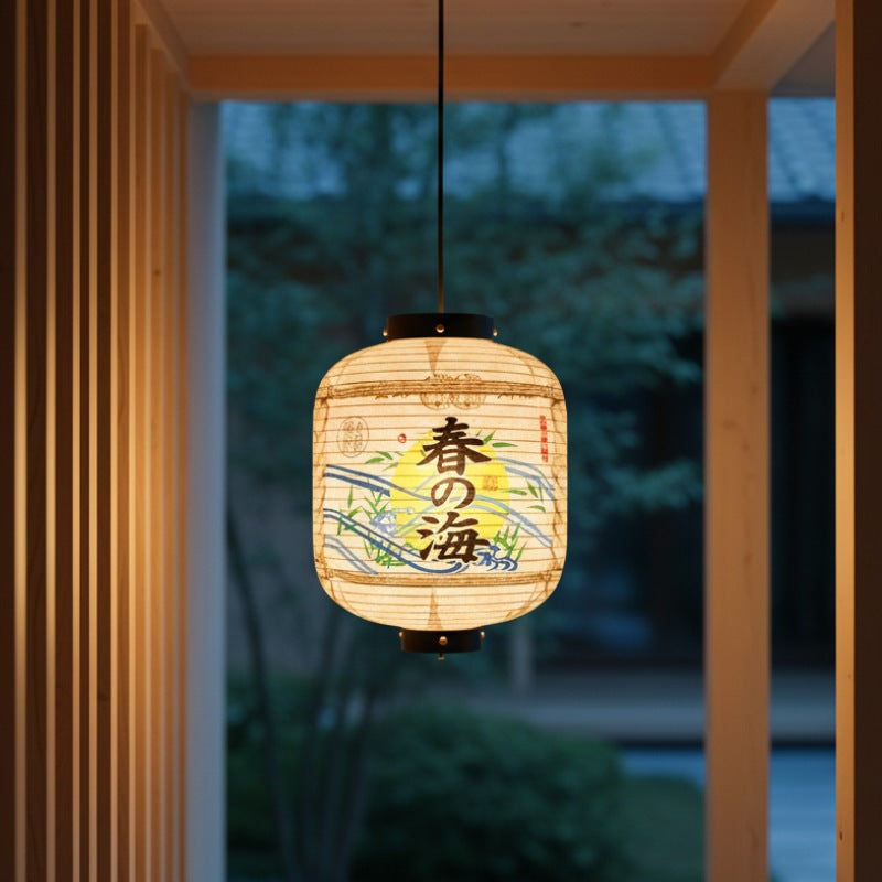 Glowing paper japanese lantern kanji with spring sea kanji and wave patterns hanging in modern wooden interior with garden views at dusk