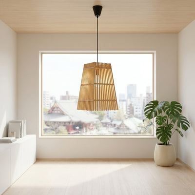 Pendant Japanese light fixture conical bamboo with vertical slats hanging in minimalist room with panoramic city window view