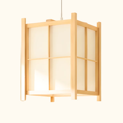 Illuminated pendant light japanese paper lantern with clean grid design and warm glow on white background