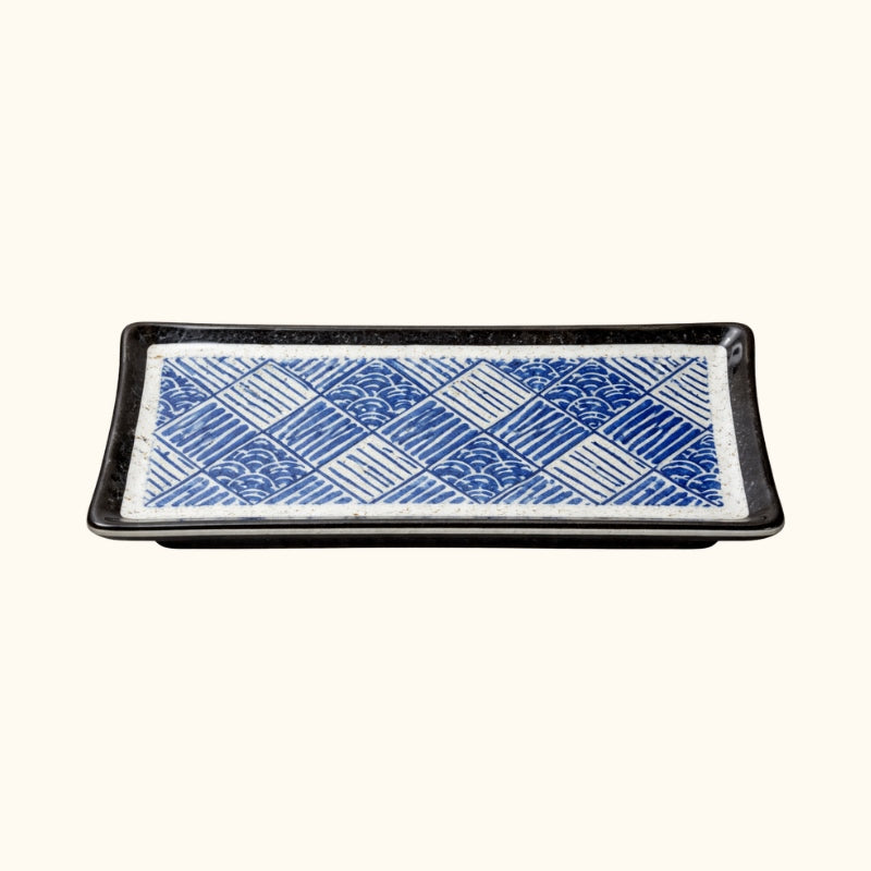 Extra long plate decoration sushi featuring intricate geometric basketweave motifs in indigo blue ceramic