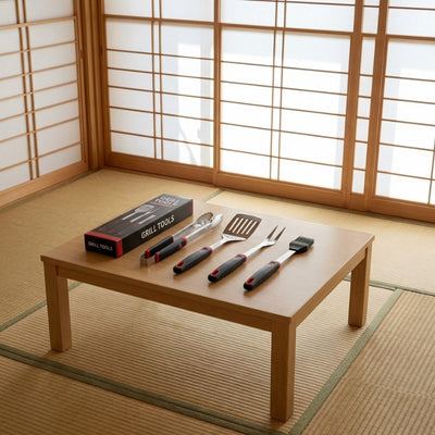 Complete set bbq tool with stainless steel spatula tongs fork and basting brush with original gift box on wooden table in Japanese tatami room with shoji screens