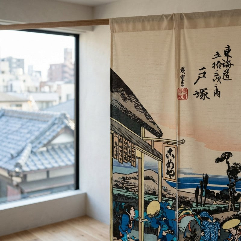 Street japanese noren door curtain Hiroshige Tokaido print near large window overlooking traditional Japanese rooftops
