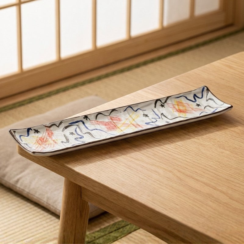 Traditional sushi plate set displayed on low Japanese table with shoji screen windows and tatami floor