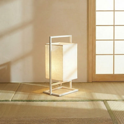 Serene table lamp japanese with fabric shade positioned on tatami mat floor near traditional shoji screen in authentic Japanese interior with afternoon sunlight