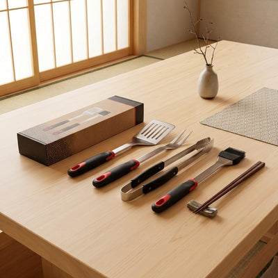 Premium tool bbq set with spatula tongs fork brush and chopsticks displayed with decorative gift box on light wood table in Japanese tatami room