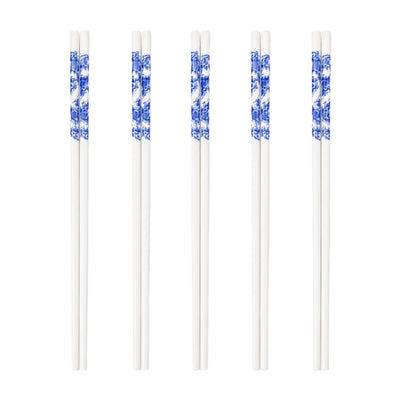 Set of 5 pairs of traditional chopsticks ceramic in white with blue porcelain flower and landscape motif on white background