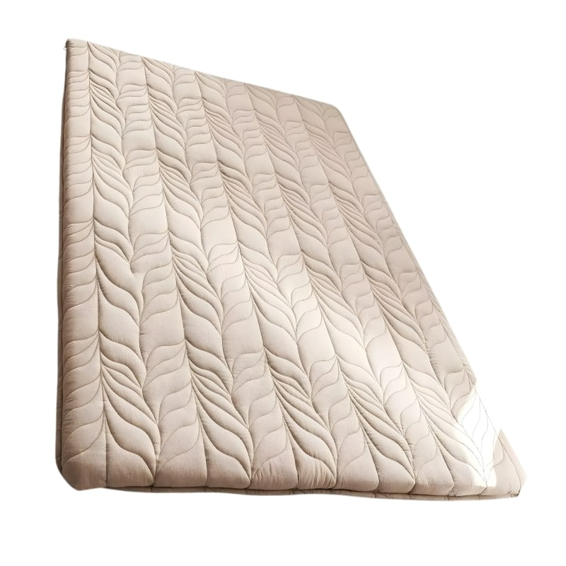Thick quilted traditional mat futon japanese with beige wave stitching pattern on clean white background