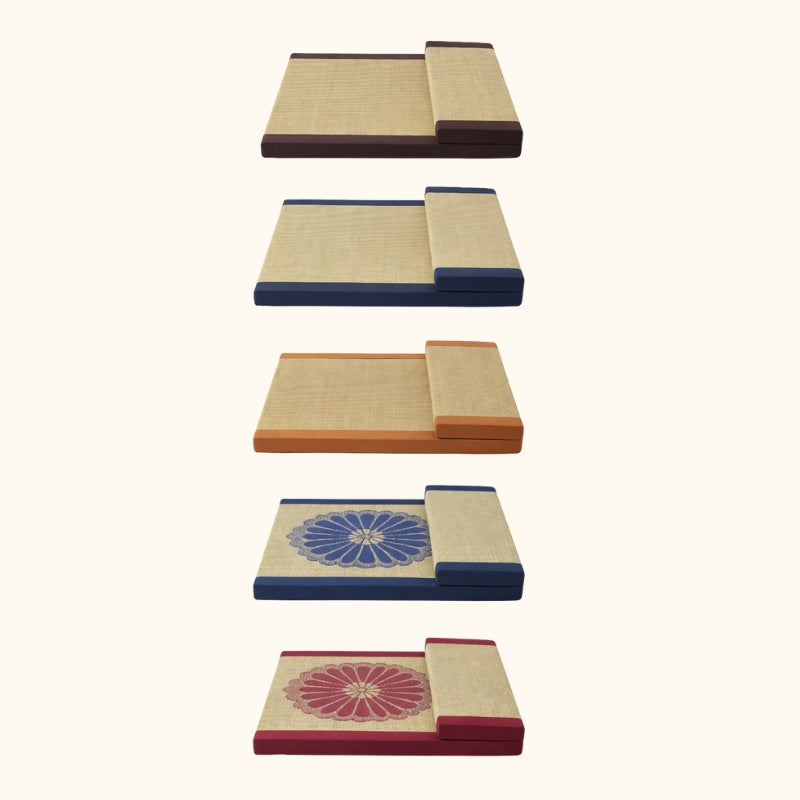Variations floor cushions collection with five japanese meditation cushions in brown navy orange blue and burgundy borders with tatami surfaces and chrysanthemum embroidery options